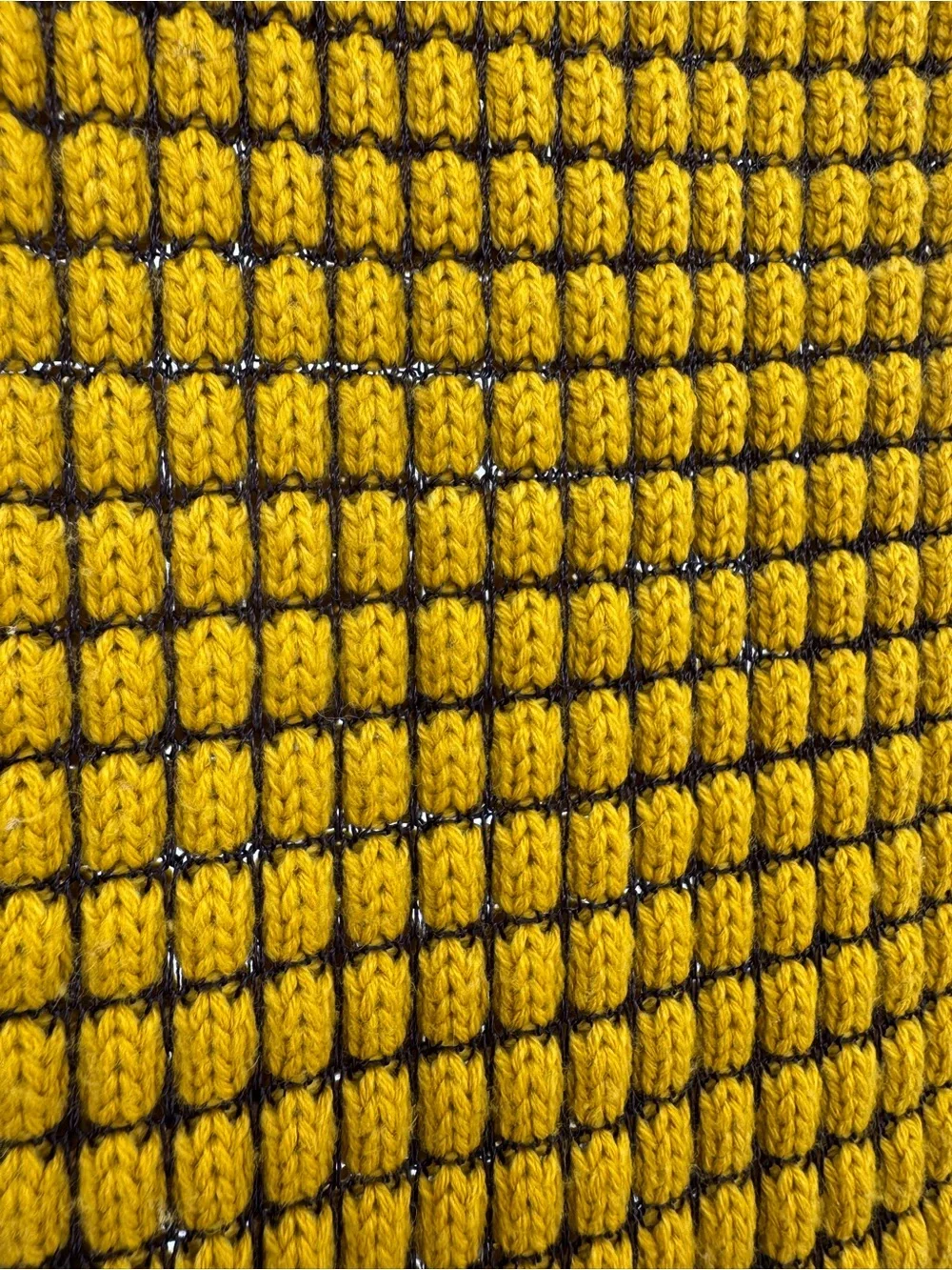 Extra long knit scarf in mustard yellow.